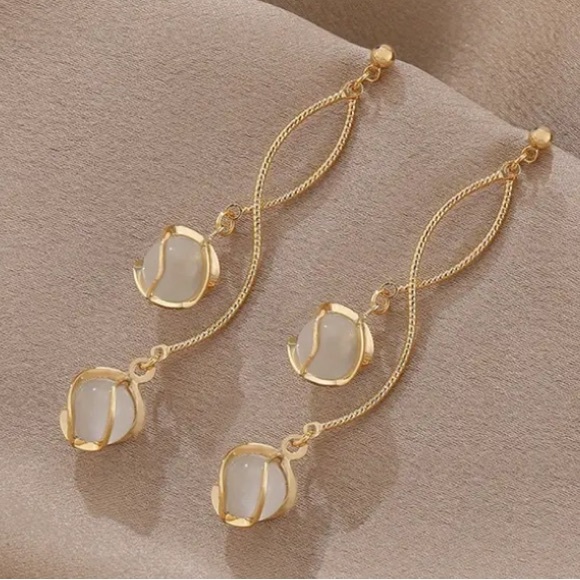 Modern Trendy Gold Toned Elongated Stud Earrings - Picture 2 of 2